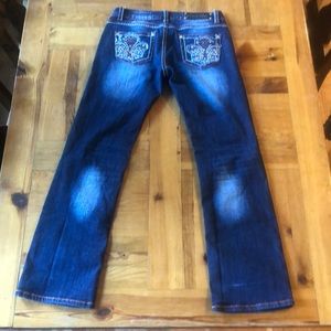 Cedar Rose Woman’s size 29x32 bootcut jeans.